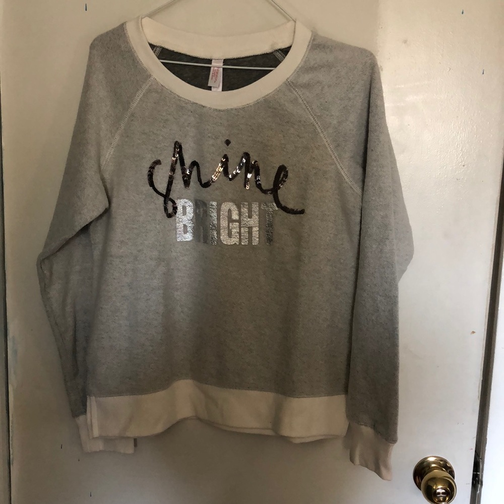 “Shine Bright” sweatshirt.